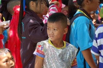 Young boy involved in the parade/concert